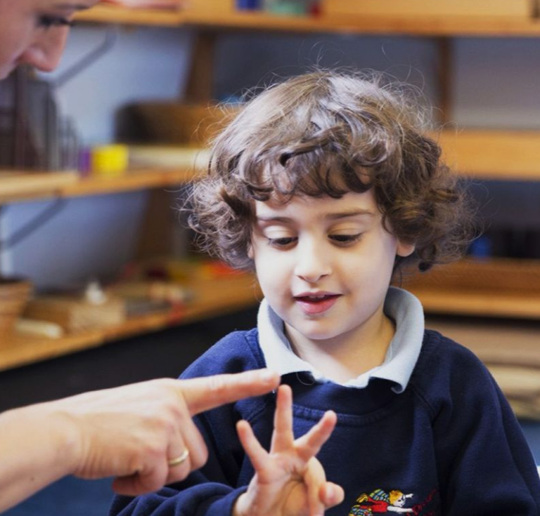 Child counting on their fingers