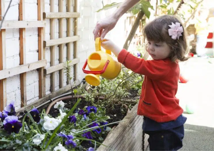 Girl watering plants