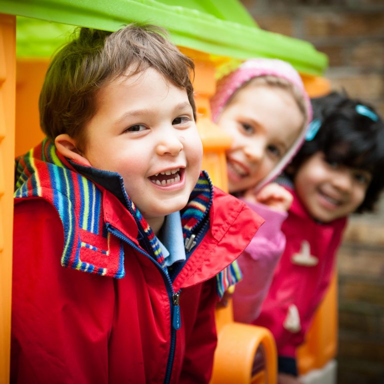 smiling children in the play area