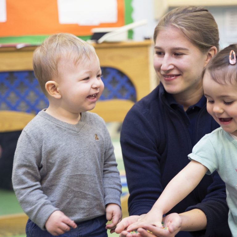 children in the classroom with the teacher