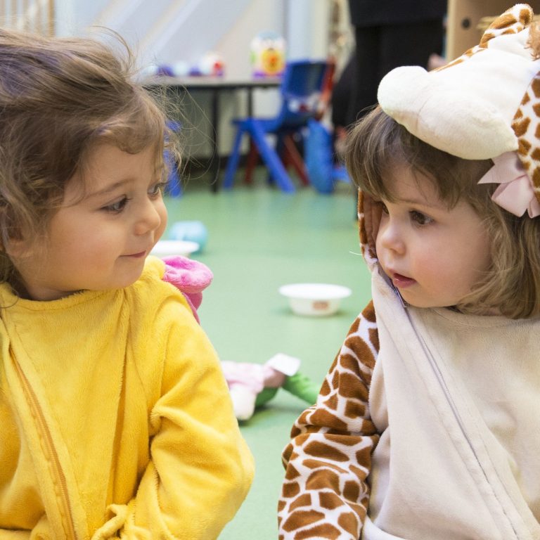 2 girls in animal outfits