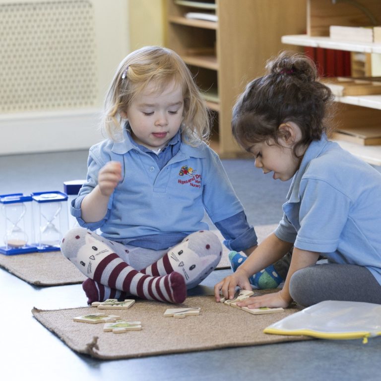 children working on a jigsaw