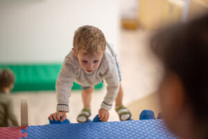 child climbing up a frame