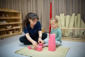 child using building blocks